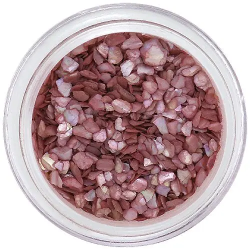 Fáradt rózsaszín, rendszertelen alakú törmelékek