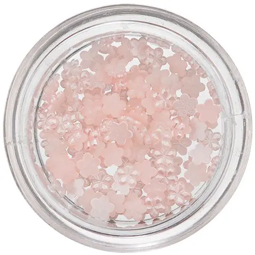 Kis virág alakú gyöngyházfényes díszek – finom rózsaszín